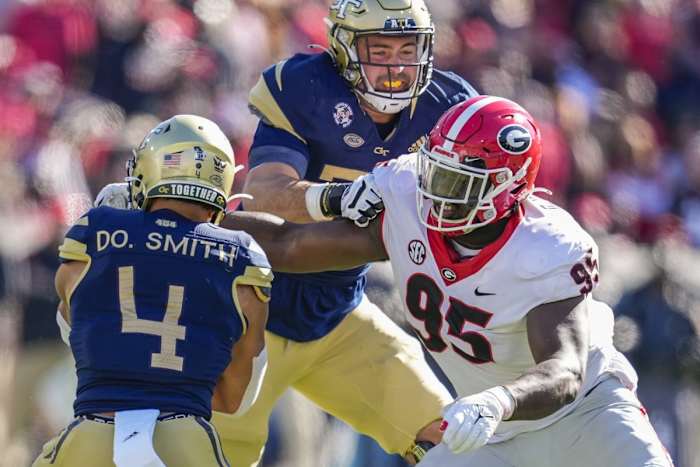 Georgia defensive lineman Devonte Wyatt (95) tackles Georgia Tech running back Dontae Smith (4). Mandatory Credit: Dale Zanine-USA TODAY Sports